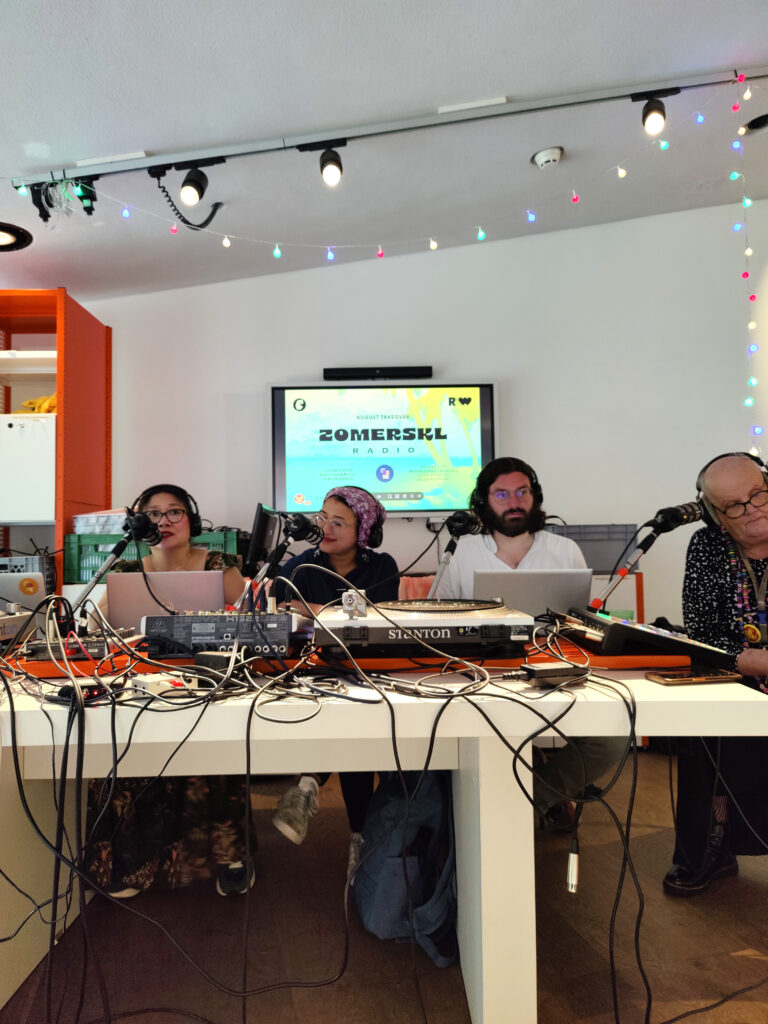 Participants broadcasting live at ZOMERSKL Radio installation, Kunsthal Rotterdam